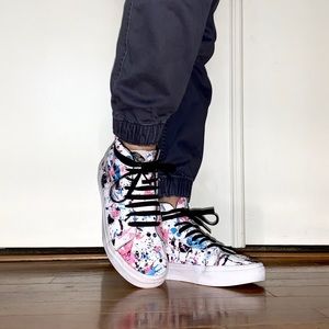 Paint splattered leather high top Vans